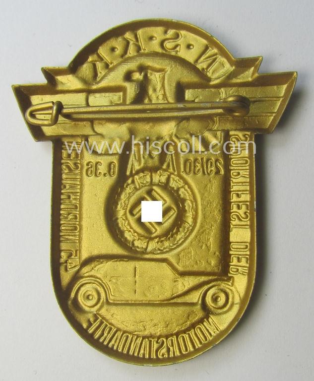 Commemorative, N.S.K.K.-related 'tinnie' being a non-maker-marked example depicting an illustration of the N.S.K.K.-logo (ie. eagle-device) and car coupled with the text: ' N.S.K.K. Sportfest der Motorstandarte 45 - Nordhausen - 29./30.8.36'