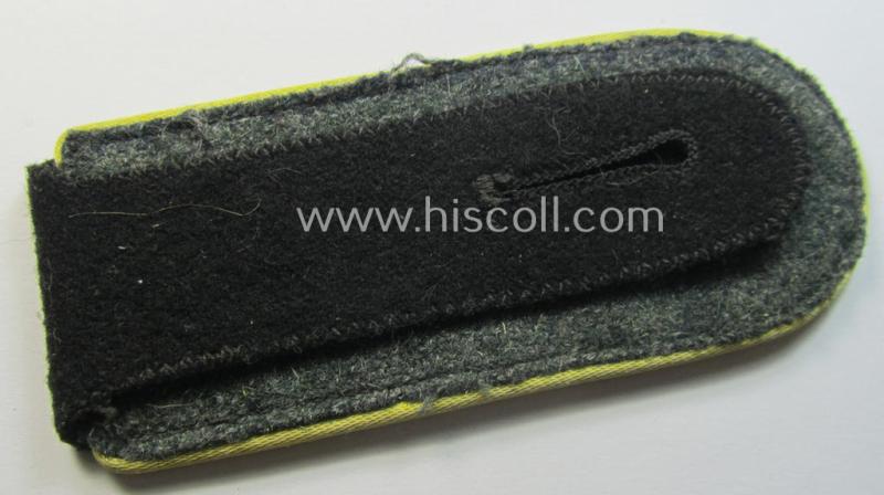 Attractive - albeit regrettably single! - Waffen-SS, EM-type shoulderstrap as piped in the bright-yellow-coloured branchcolour as was intended for usage by an: 'SS-Mann' who served within the: 'SS-Nachrichten-Truppen'