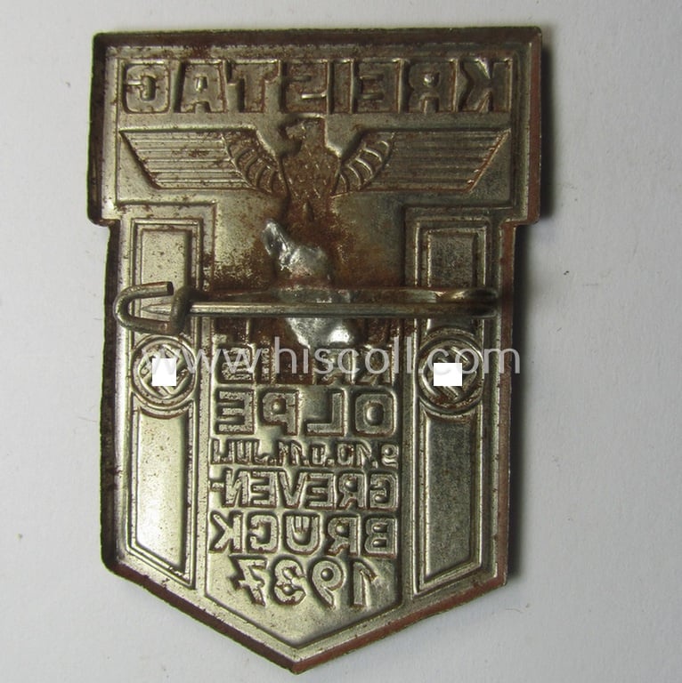 Commemorative, so-called: N.S.D.A.P.-related 'tinnie' (ie. 'Tagungs- o. Veranstaltungsabzeichen'-) being a non-maker-marked example showing the text: 'Kreistag - NSDAP Kreis Olpe - 9.10.11. Juli - Grevenbrück 1937'