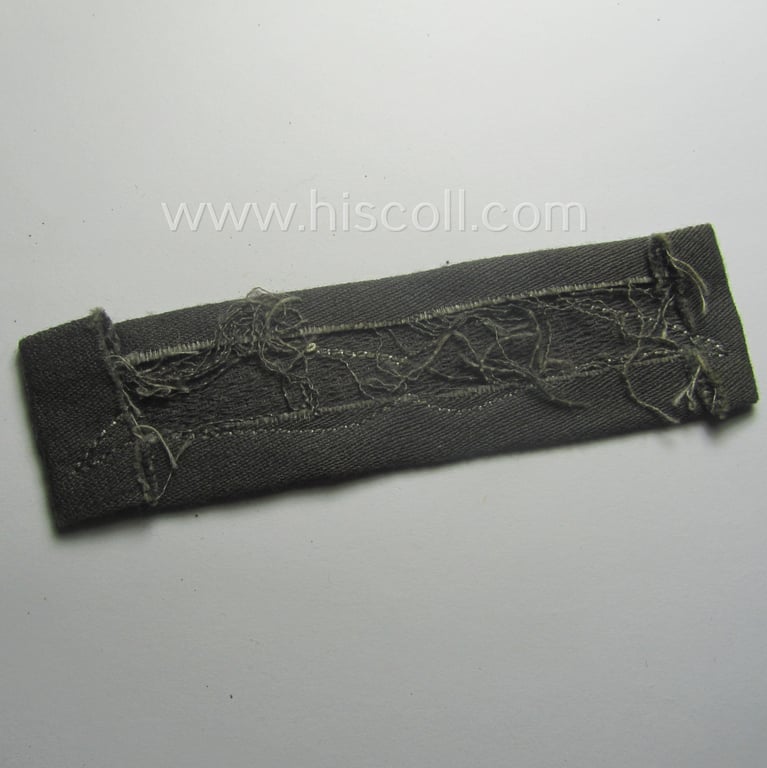 Single, WH (Luftwaffe) greyish-blue-coloured, NCO-type rank-patch (aka 'moustache'), as was intended for usage by a non-commissioned officer with the rank of: 'Unteroffizier'