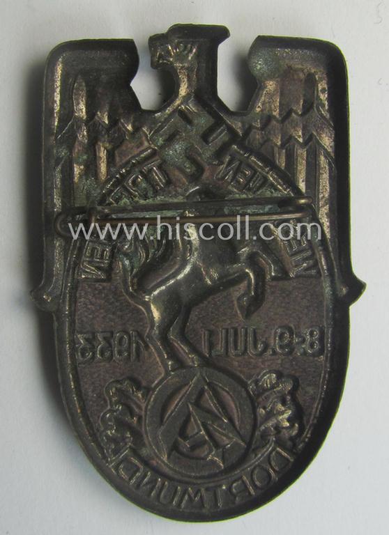 Commemorative- and/or copper-toned, golden-bronze-coloured N.S.D.A.P.- (ie. SA-) related 'tinnie' being a non-maker-marked example showing a detailed eagle-device, SA-logo- and text: 'Westfalentreffen - Dortmund - 8.9. Juli 1933'