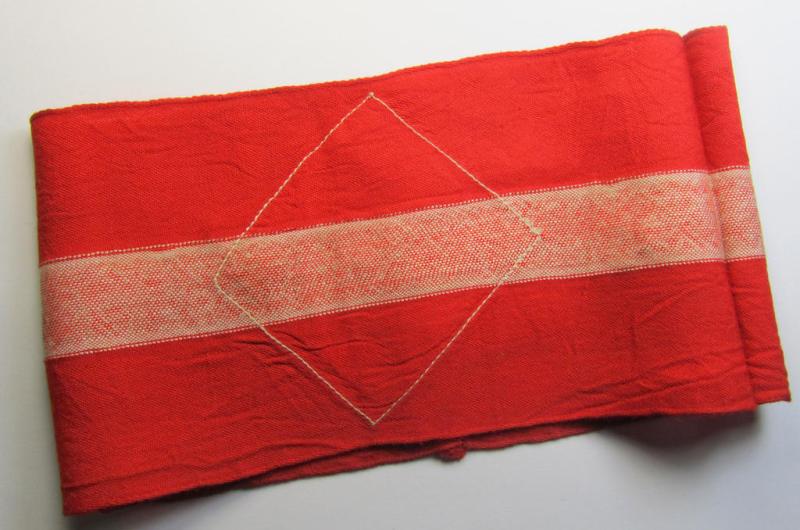 Attractive - and nowadays scarcely found! - 'standard'- (ie. entirely woven) pattern, bright-red-coloured HJ- (ie. 'Hitlerjugend'-) related armband (ie. 'Armbinde') being a moderately worn- ie. used example that regrettably misses its 'RzM'-e...