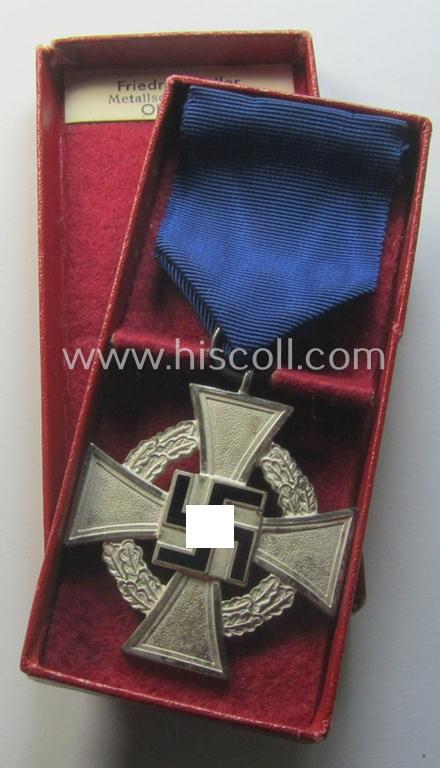 Neat, 'Treuedienst Ehrenzeichen 2. Klasse' being a non-maker-marked example that came mounted onto its original ribbon (ie. 'Bandabschnitt') and that came stored in its maker- (ie. 'Friedrich Keller'-) marked etui (ie. two-pieced box)