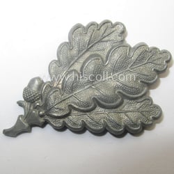 WH (Heeres) greyish-silver-coloured so-called: 'M43'-pattern cap-badge (ie. 'Mützenabzeichen')...