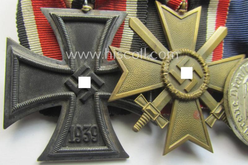 4-pieced WH (Heeres o. KM etc.) medal-bar (ie.: 'Ordenspange') resp. showing an: 'EKII. Kl.', a: 'KvK II.Kl. mit S.', a: 'WH-DA 4. St.' (with eagle-device) and a: Czech 'Anschluss'-medal (with a firmly attached 'Prager Burg-Spange')