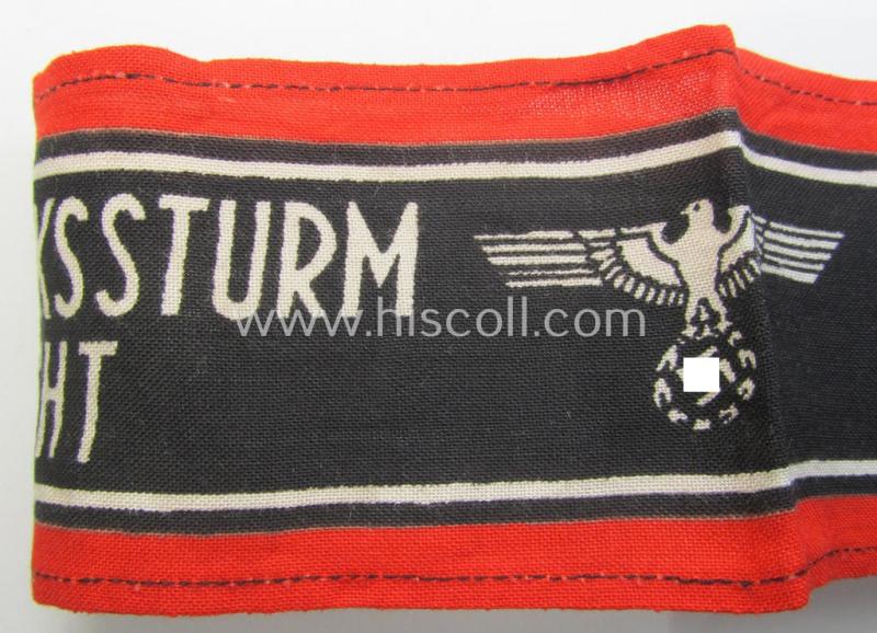 Superb, typically printed- and/or later-war-period, bright-red- and/or black-coloured so-called: 'Deutscher Volkssturm'-armband (ie. 'Armbinde') that comes in an overall very nice- (I deem hardly used- nor worn- ie. 'virtually mint'-), conditio...