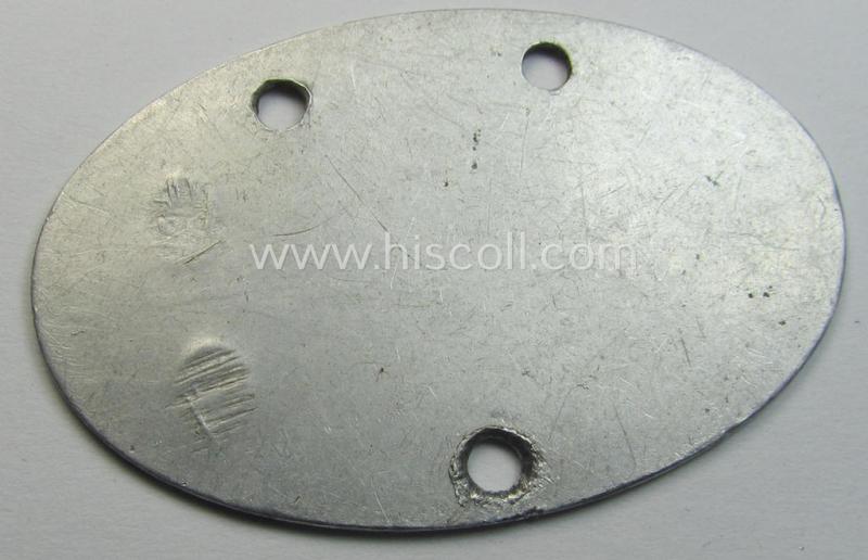 Early-war- (albeit 'standard-issue'-) pattern, WH (Kriegsmarine) typical aluminium- based- and silver-toned ID-disc (ie. 'Erkennungsmarke') bearing the engraved numeral (ie. date) that reads: 'Karl Kallmeier N 17923/41 K'