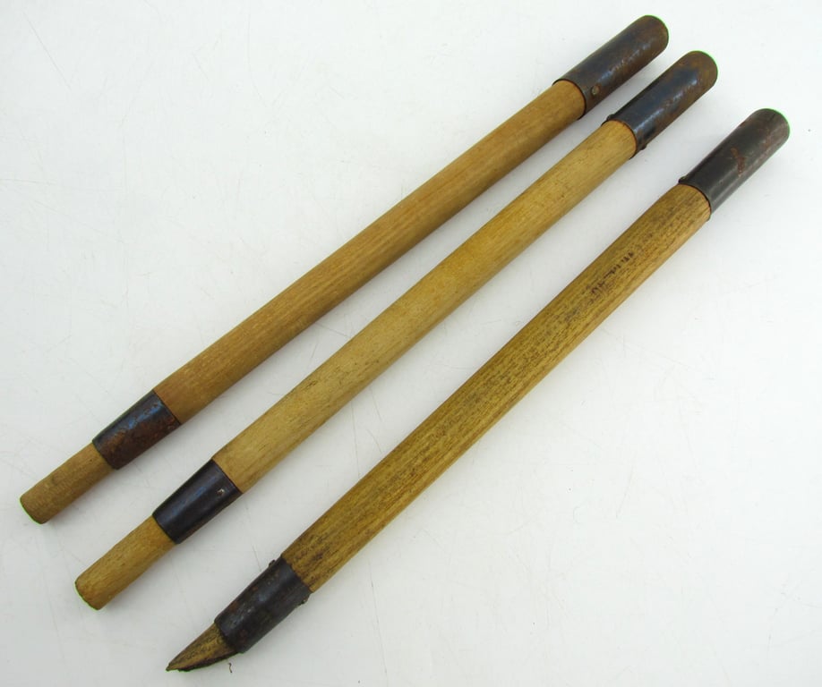 Matching set of 3 wooden tent pegs