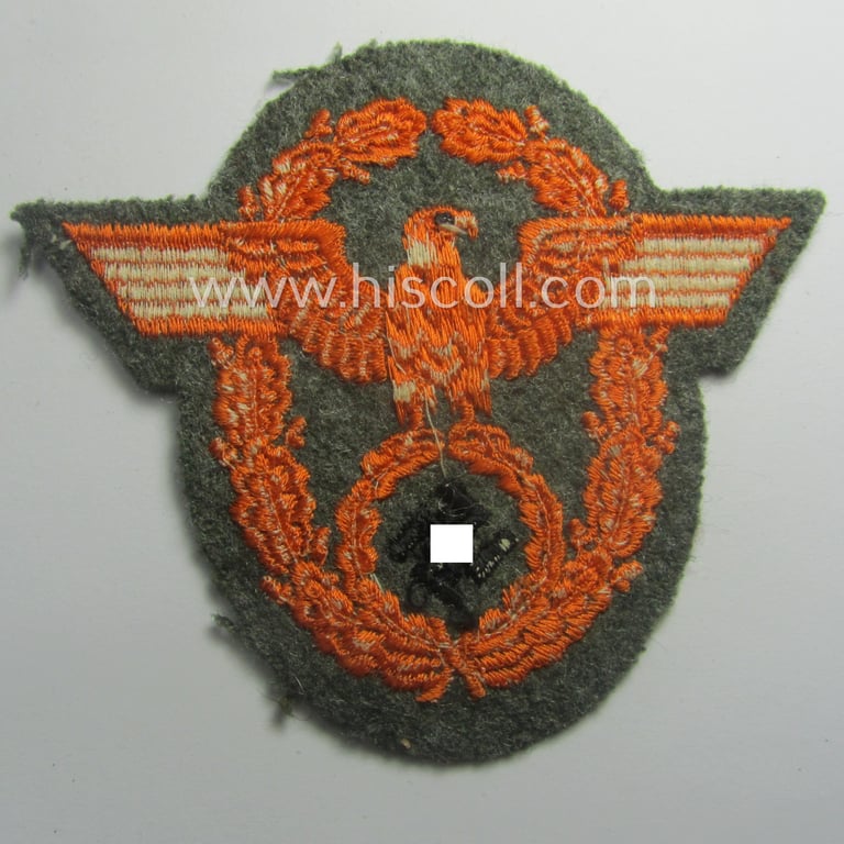 Field-police- (ie. WH (Heeres) related-) arm-eagle (ie. 'Ärmeladler') as was intended for usage by the staff of the notorious 'Feldgendarmerie-Truppen'