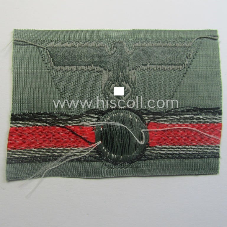 WH (Heeres) so-called: 'M43-pattern') cap-eagle/cocarde (ie. cap-trapezoid) as was specifically produced for usage on the so-called: 'M-43'-model field-caps (ie. 'Einheitsfeldmützen')