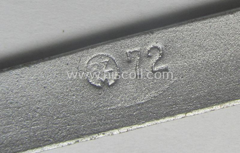 Interesting, WH (Heeres-, Luftwaffe ie. Waffen-SS etc.) bright-silver-coloured WH-officers'-type-belt-buckle (ie. 'Zweidornschnalle für Offiziere') being a simply never used- nor worn example that shows the makers'-designation: 'RzM 72'