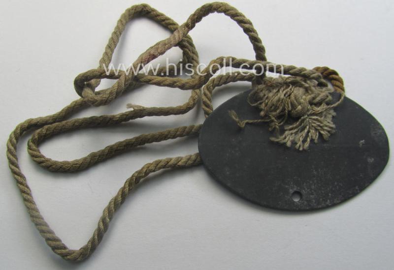 Interesting, early-war- (albeit 'standard-issue'-) pattern, WH (Kriegsmarine) typical zinc-based- and/or greyish-silver toned ID-disc (ie. 'Erkennungsmarke') bearing the engraved text that simply reads: 'Hans-Helge Hoffmann - San.Offz. Okt. 1941...