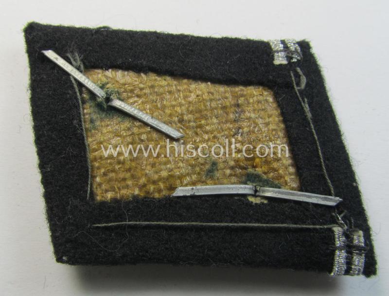Attractive - and clearly used and or tunic-removed! - Waffen-SS NCO-pattern rank-collar-rank-tab ('Kragenspiegel') being a 'standard-issue'-pattern example as executed in black-coloured wool as was intended for usage by an: 'SS-Hauptscharführer...