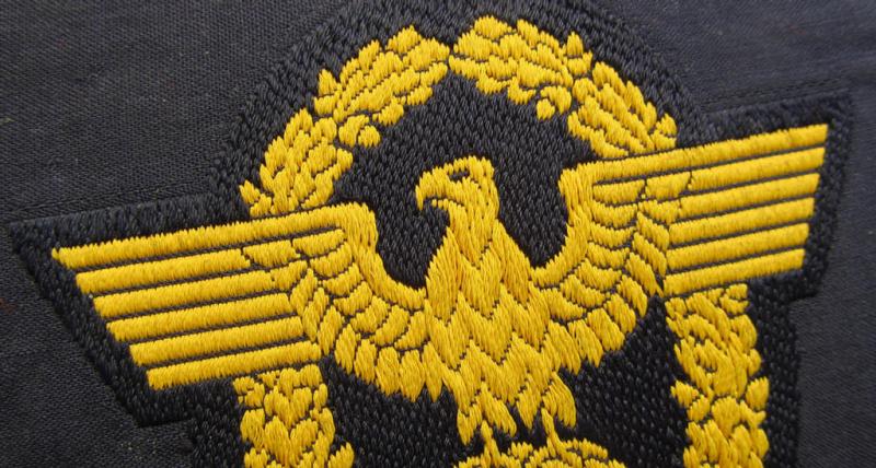 Attractive, golden-yellow-toned- (and/or neatly 'BeVo'-woven!) arm-eagle (ie. 'Wasserschützpolizei-Ärmeladler') as was intended for usage on the various, darker-blue-coloured: 'Wasserschützpolizei'-tunics