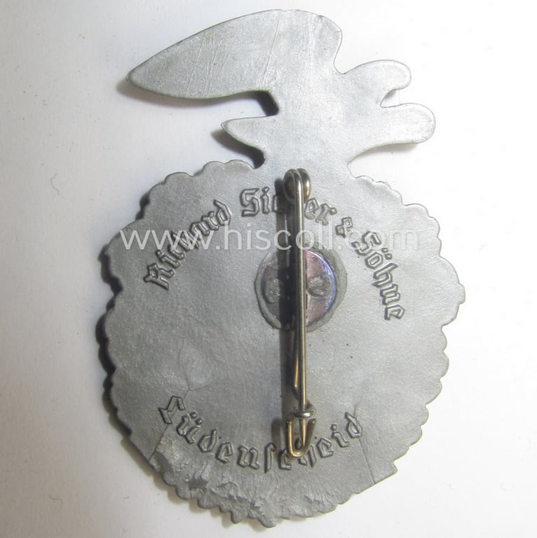 Commemorative, resin-based SA- (ie. 'Sturmabteilungen'-) related 'tinnie', being a maker- (ie. 'R. Sieper & Söhne'-) marked example depicting an eagle-device and SA-logo coupled with the text: 'SA-Wettkampftage der SA-Gruppe Niedersachsen - 1938'