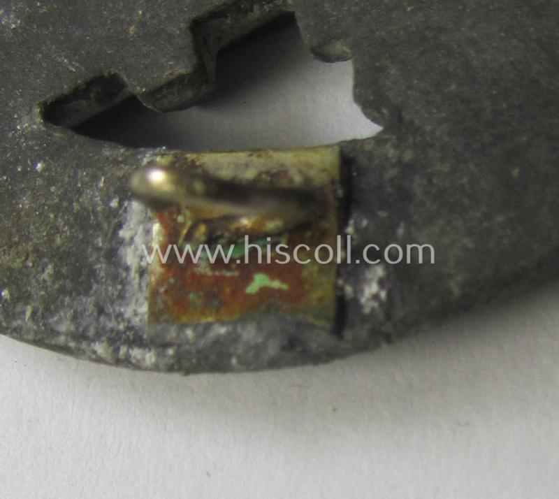 'Allgemeines Sturmabzeichen' (or: General Assault Badge ie. GAB) being a typical unmarked, zinc-based- (ie. 'Feinzink'-) and/or: 'flat-back'-version as was (I deem) produced by the: 'Rudolf Karneth'-company