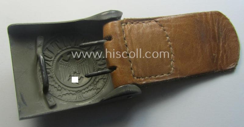 'Virtually mint', 'standard-issue'-pattern, WH (Heeres) field-grey-toned- and steel-based belt-buckle being a non-maker-marked example that comes mounted onto its 'G.H. Osang'-marked and/or '1940'-dated tab