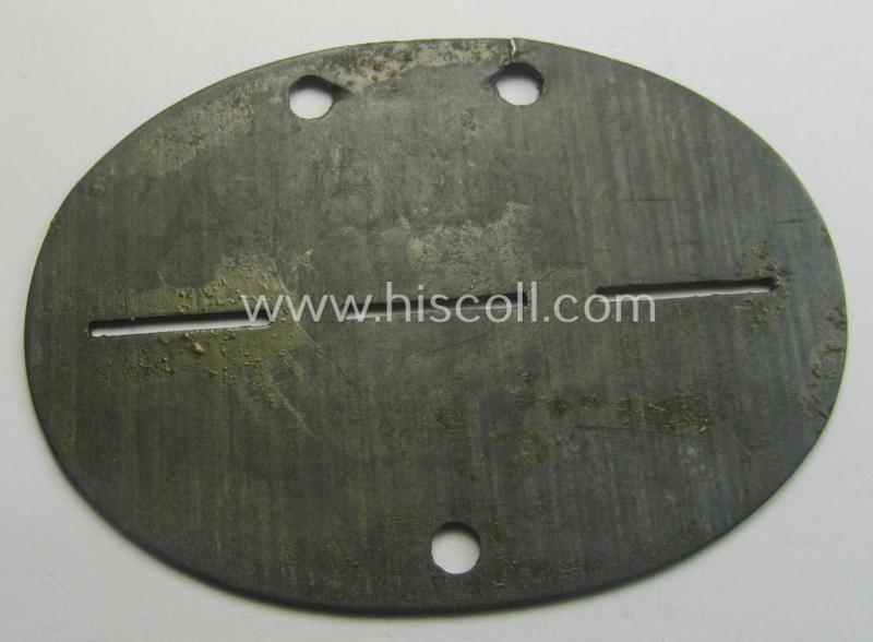 Zinc-based, WH (Heeres) 'Grenadiere'-related ID-disc bearing the clearly stamped unit-designation that reads: 'Stammkomp.G.E.B.338' and that comes as issued and/or worn