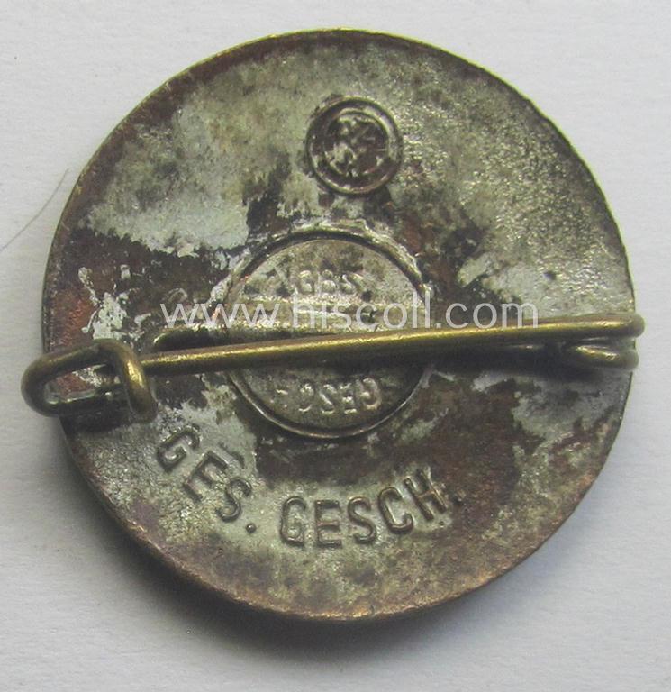 Early-pattern 'N.S.D.A.P. - Parteiabzeichen' showing a (double!) so-called: 'Ges.Gesch.'-patent-pending-designation