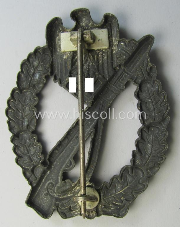 Attractive, 'hollow-back'-pattern 'Infanterie Sturmabzeichen in Silber' (or: silver infantry-assault badge ie. IAB) being a non-maker-marked example as executed in zinc-based metal (ie. 'Feinzink') as was produced by the: 'Wilh. Deumer'-compa...