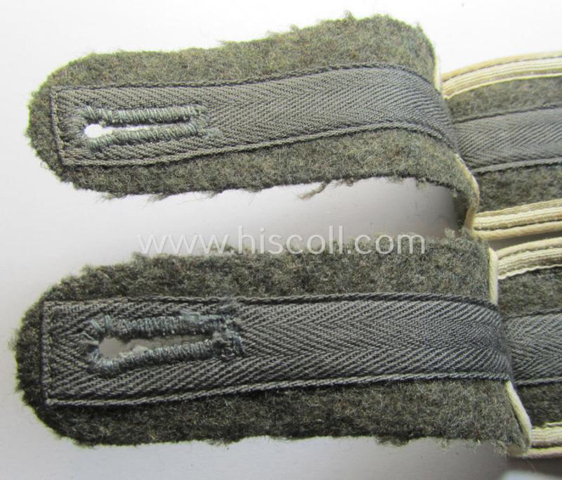 Superb - and fully matching! - pair of later-war-period, so-called: 'M44'-pattern, 'simplified' WH (Heeres) EM-type shoulderstraps as piped in the white-coloured branchcolour as was intended for usage by a: 'Soldat der Infanterie-Truppen'
