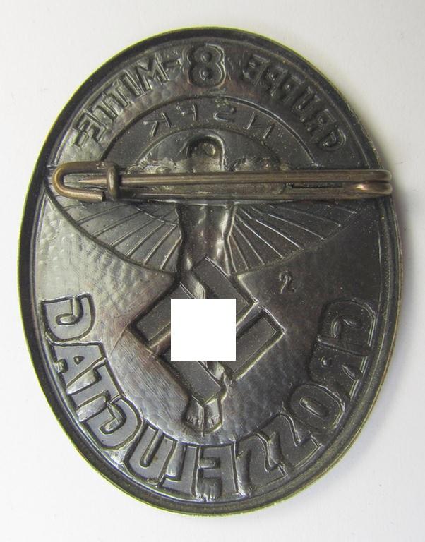 Copper-bronze-toned, N.S.F.K.-related day-badge (ie. 'tinnie') being a non-maker-marked example as was issued to commemorate a specific meeting ie. national rally entitled: 'N.S.F.K. Grossflugtag der Gruppe 8 Mitte'
