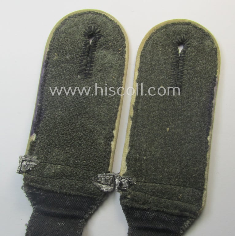 Superb pair of Waffen-SS EM-type shoulderstraps as piped in the white-coloured branchcolour as was intended for usage by an: 'SS-Schütze u. Unterführer-Anwärter' who served within the: 'Waffen-SS Infanterie-Trpn.'