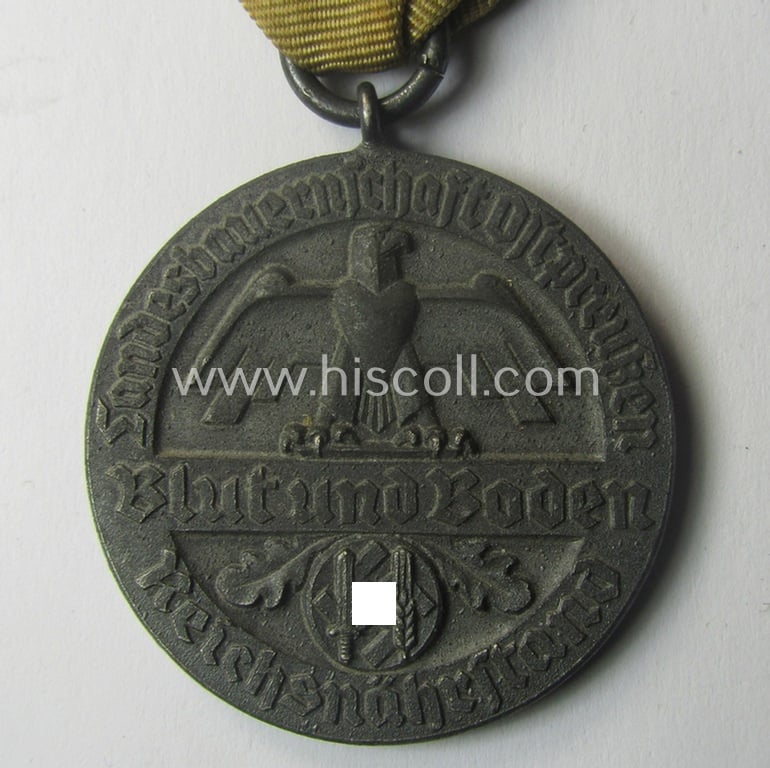 Silverish-grey-toned, typical 'Reichsnährstand'- (ie. 'RNSt.'-) related, (portable) loyal-service-award entitled: 'Reichsnährstand - Landesbauernschaft Ostpreussen - Für 10 Jahre Pflicht und Treue'