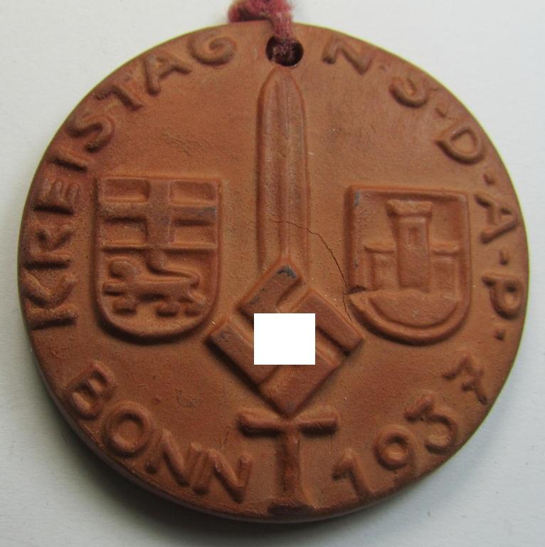 Attractive - and most certainly not that often encountered! - brownish-red-toned- and/or: 'earthen-ware'-based, so-called: 'Erinnerungs-Medaille' showing an upward-positioned sword coupled with the text: 'Kreistag N.S.D.A.P. - Bonn 1937'