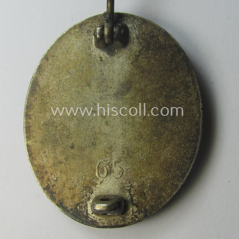 Silver-class wound-badge (or: 'Verwundeten-Abzeichen in Silber') being a maker- (ie. '65'-) marked example as was produced by the 'Hersteller' ie. maker: 'Klein u. Quenzer'