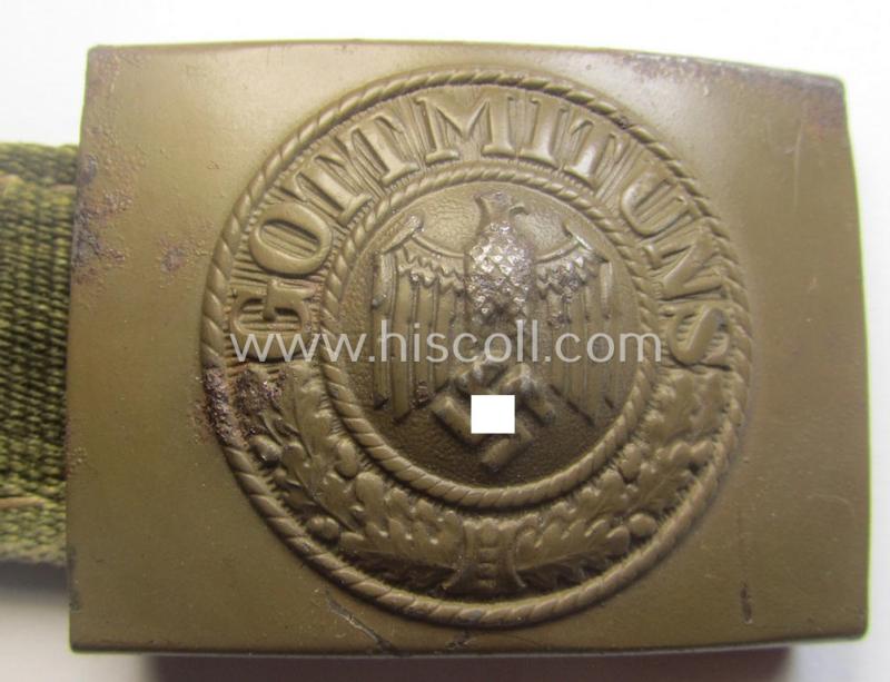 WH (Heeres) 'tropical-issued' belt-buckle being a non-maker-marked, field-grey-coloured example that comes mounted onto its original, greenish-coloured- (and/or: 'webbing'-based-) tab