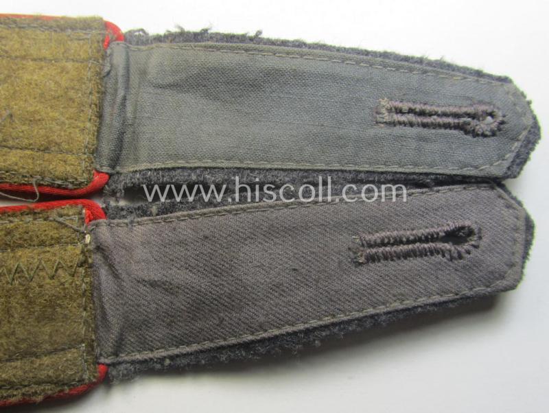 Pair of WH (Luftwaffe) NCO-type shoulderstraps as piped in the bright-red branchcolour as was intended for an: 'Uffz. o. Unterwachtmeister der Flak-Art.-Trpn.'