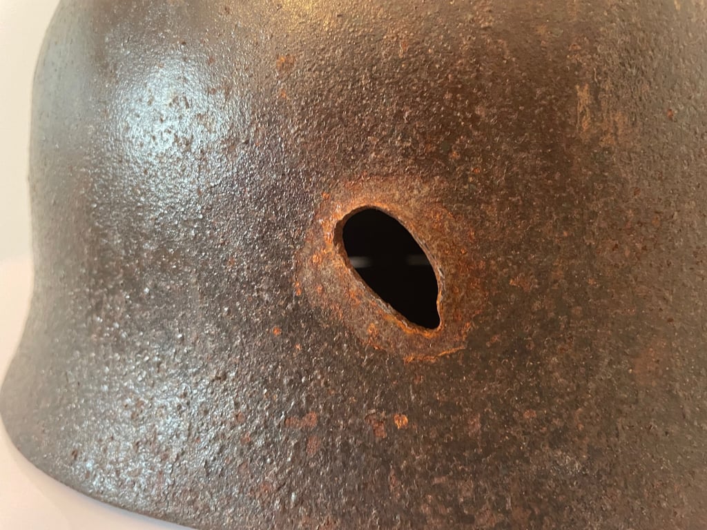 ORIGINAL WWII GERMAN M38 FALLSCHIRMJAGER HELMET WITH BULLET HOLE.