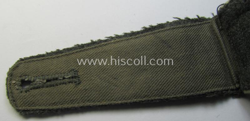 Attractive - moderately used albeit regrettably single! - neatly 'cyphered', so-called: 'M41- (ie. M43-) pattern', WH (Heeres) NCO-type shoulderstrap as was specifically intended for a: 'Feldwebel des Maschinengewehr-Abteilungs 4'