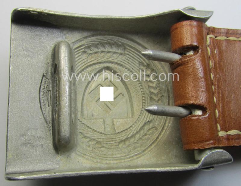 'Reichsarbeitsdienst'- (ie. RAD-) EM- (ie. NCO-) type belt-buckle being a maker- (ie. 'Paulmann & Crone'-) marked example which is dated: '1936' and that comes mounted onto its leather-based tab