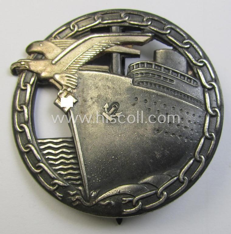 Attractive - and complete! - set comprising of a WH (KM) 'Blockadebrecher-Kriegsabzeichen' being a maker- (ie. 'Schwerin'-) marked example that comes together with its accompanying 'Halbminiatur', both as executed in multi-coloured 'Buntmetall...