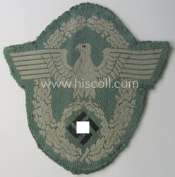 Clearly used- and/or tunic-removed, police- (ie. 'Polizei'-) related...