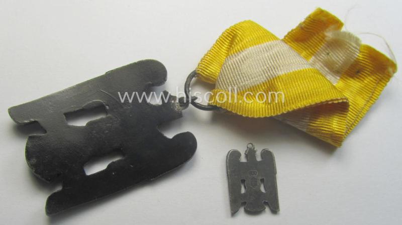 'Schlesisches Bewährungsabzeichen der II. Kl.' (or: 'Schlesischer Adler 2. Stufe') being a just moderately used example that comes mounted onto its full-length ribbon (ie. 'Bandabschnitt') and accompayning miniature as found