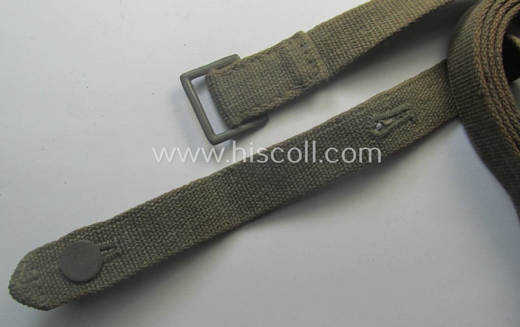 Complete, 2-pieced 'standard-issue'-pattern- (ie. typical WH-issue) carrying-strap (ie. 'Tragelasche') as was intended for the various gasmask-containers (being a non-maker-marked example that comes in a just minimally used, condition)