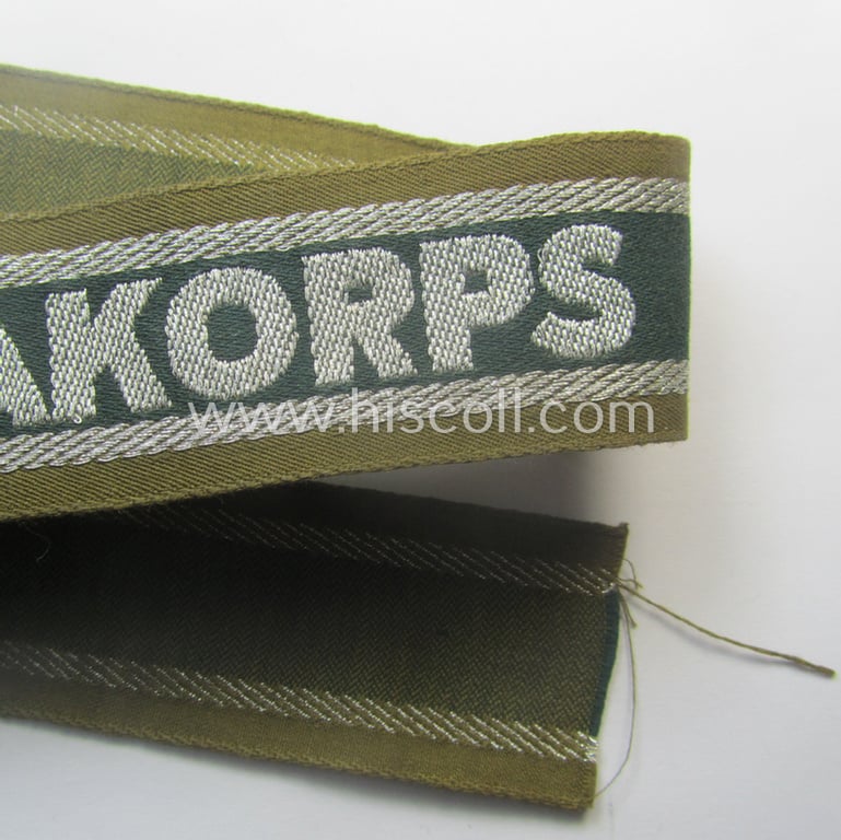 'BeVo'-like cuff-title (ie. 'Ärmelstreifen') entitled: 'Afrikakorps' being a presumably issued but simply never worn example that comes in an overall very nice- (ie. non-shortened- and never tunic-attached-), condition