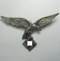 Attractive, silver-coloured- (and/or I deem tin-based), WH (Luftwaffe)...