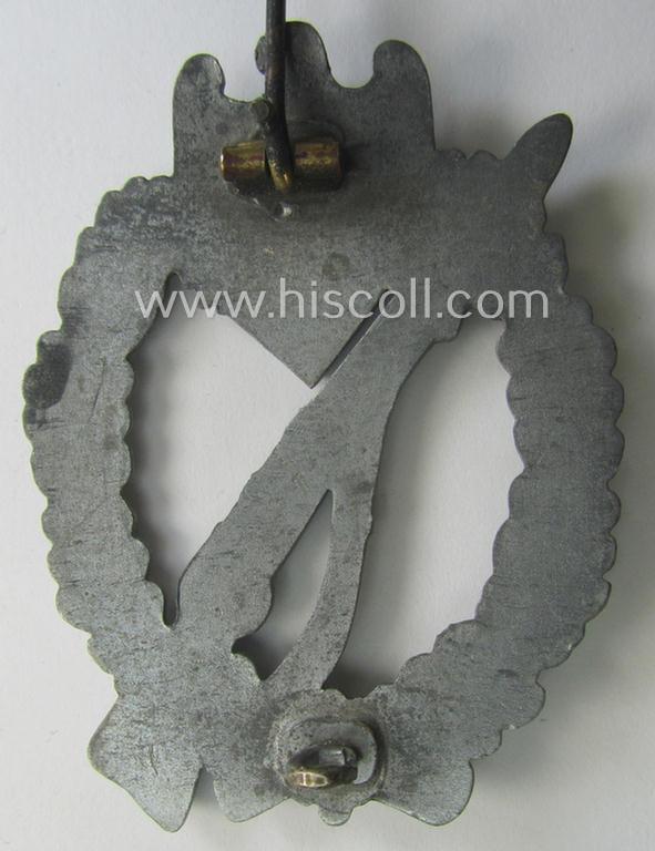 'Infanterie Sturmabzeichen in Silber' being a (typical) non-maker-marked and/or quite converse, 'solid-back' example as was executed in greyish-silver-coloured, zinc-based metal by the maker: 'Frank & Reif'