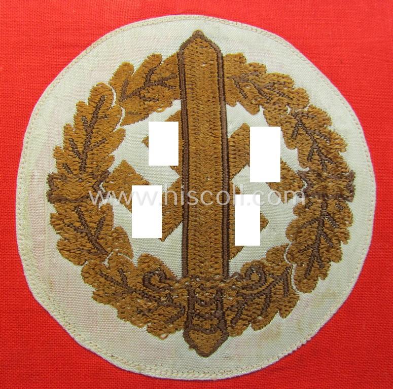 Attractive, linnen-based armband (ie. 'Armbinde') as was intended for usage by the staff of the: 'SA-Wehrmannschaften' (being a hardly used example that still shows its period-attached so-called: 'RzM'-etiket)