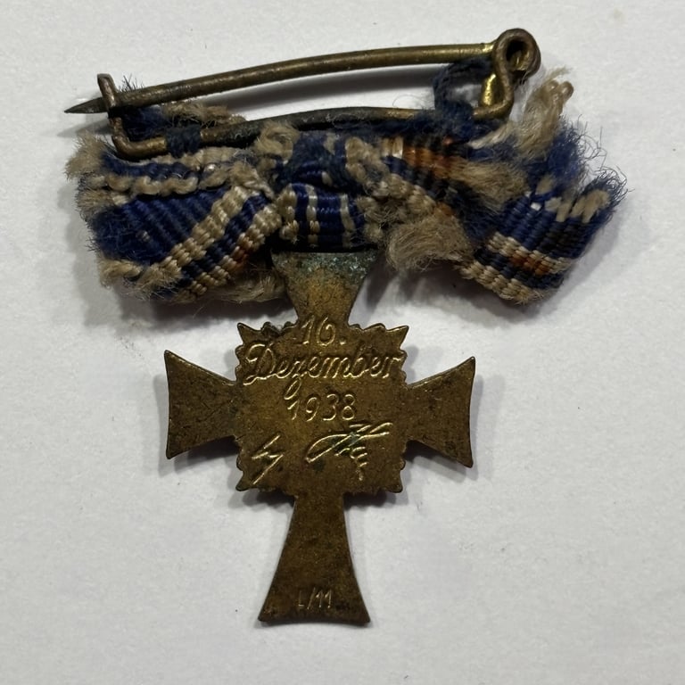 Miniature Mother's Cross in Bronze on Bow Ribbon