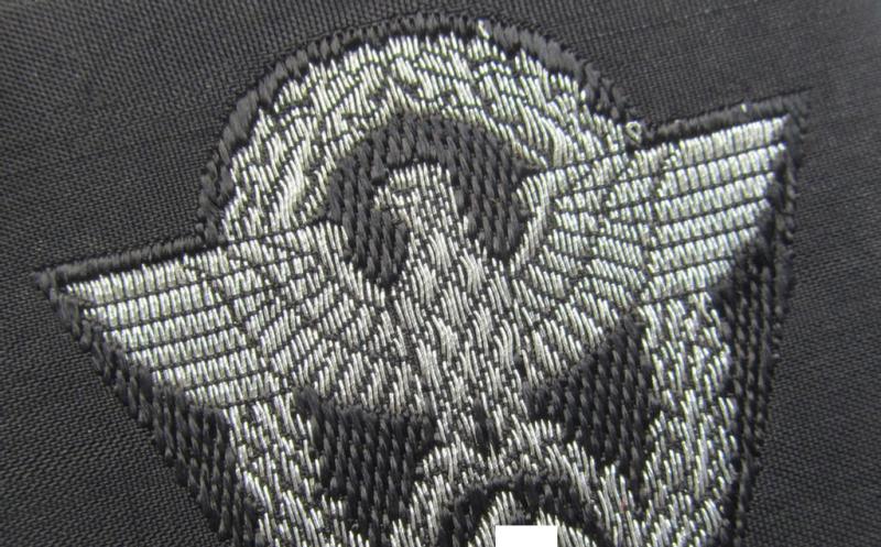 Attractive - and nowadays scarcely encountered! - police ie. 'Polizei'- (ie. 'SS-Polizei'-) flatwire 'BeVo'-woven, officers'-pattern cap-eagle (ie. 'Adler für Offiziers-Schiffchen o. Einheitsfeldmütze der Polizei o. SS-Polizei')
