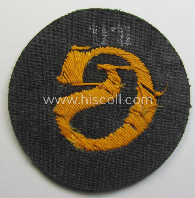 WH (Heeres) so-called: trade- and/or special-career arm-insignia (ie. 'Laufbahn- o. Tätigkeitsabzeichen') as intended for a: 'Schirrmeister' (being a neatly hand-embroidered variant as mounted onto a darker-green woolen background)