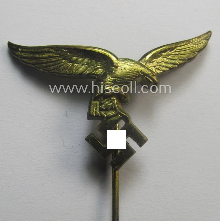 Bright golden-toned lapel-pin (ie. 'Zivilabzeichen') to be worn on the civil attire as was intended for usage by the various staff-members of the 'Luftwaffe' (depicting an early-pattern- ie. 'down-tailed'-eagle-device)
