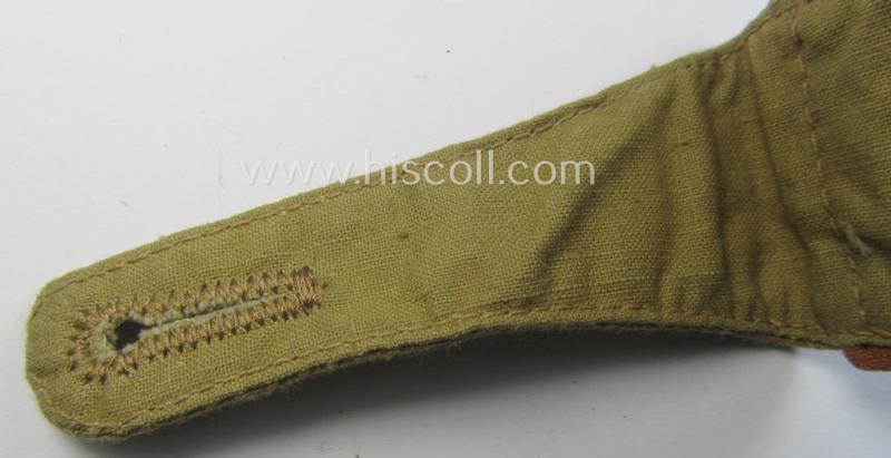 Single, WH (Luftwaffe) tropical-issued, EM-type-shoulderstrap as executed in beige-coloured linnen (as was specifically intended for usage on the tropical-shirts ie. tunics) as was intended for a: 'Soldat der Nachrichten-Truppen'