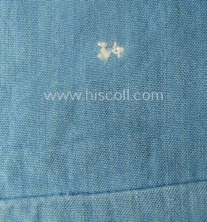 Light-blue-coloured and neatly 'BeVo'-woven, so-called: RLB (or: 'Reichsluftschutzbund') 'Amtsträger'-armband depicting the typical 'RLB'-logo (without lettering) and showing an interwoven makers'-designation (ie. '34'-numeral)