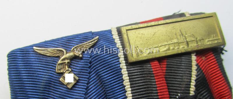 Superb example of a two-pieced WH (Luftwaffe) medal-bar (ie.: 'Doppelspange') resp. showing a: 'WH-DA 4. Stufe' and a Czech 'Anschluss'-medal that comes with a firmly attached 'Prager Burg-Spange'
